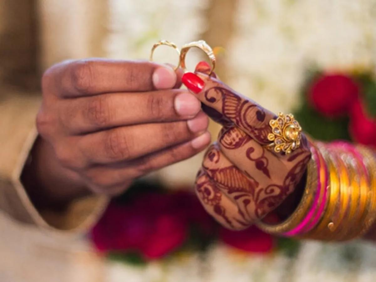 groom shoots bride